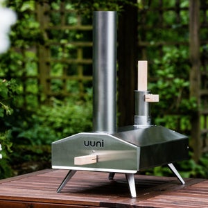 Wood-fired pizza before you can down your first beer.