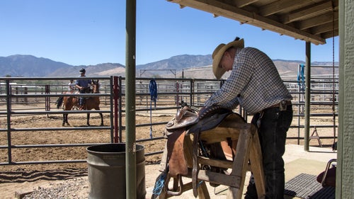 “I don’t train horses. I train men,” says Hank Curry, while mending a worn saddle. Hank, a former cowboy and horse wrangler, is responsible for teaching the prisoners and horses how to respond to each other. “You have to develop those guys’ ability to follow instructions. These are life skills they’ll need to learn on the outside. It doesn’t always pertain to horse training.”