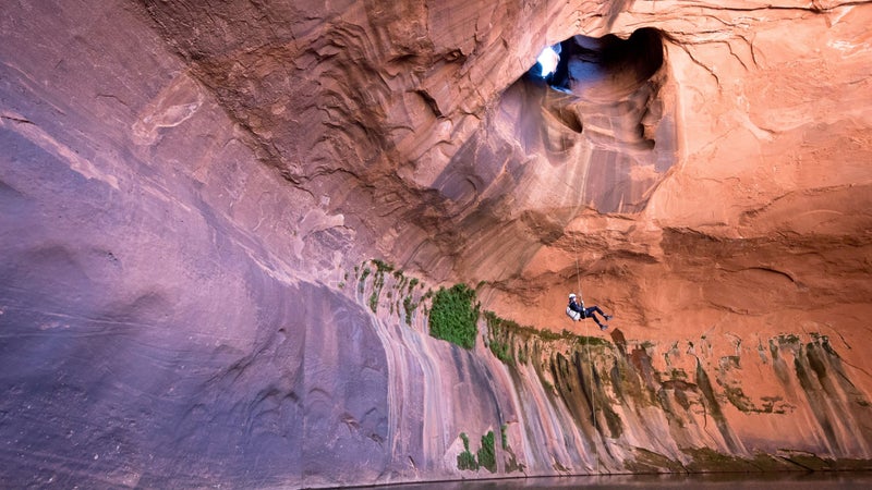 Joey Schusler rapelling into the Golden Cathedral.