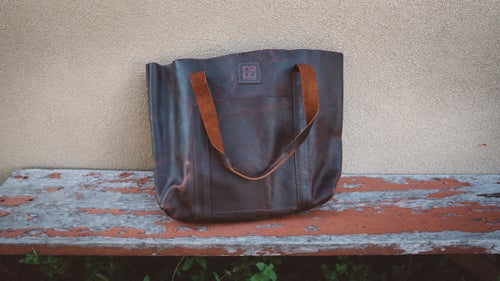A mammoth main compartment makes this bag functional for everyday carry items. Locally sourced bison leather makes it beautiful.