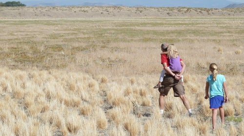 Branch hikes with his two daughters.