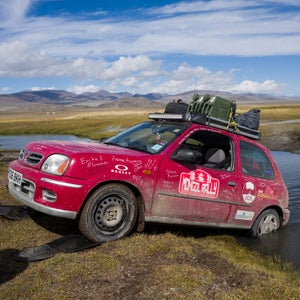 How about this for a vacation idea? Fly to Europe, buy a beat-up clunker, then try to make it from England to Mongolia as fast as you can. There’s no official route and no official rulebook. Photographer Drew Gurian and his brother, Scott, did just that this summer as participants in the Adventurists’ Mongol Rally. They bought 990ML 60-horsepower Nissan Micras, and after 53 days, 18 countries, a couple broken axles, and an emergency extraction, they crossed the finish line. We talked to to the New York City–based photographer about some of his most memorable times on the road. 

Photo: Every day brought a different hole that we needed to be pulled out of. Here, our friends and adventure mates Rosi Moore-Fiander and Jane Box help us out of a crossing that proved too deep.
