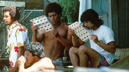 Buttons Kaluhiokalani (standing, center), regarded as one of the most gifted surfers of his time, with his friends in Hawaii, October 1979. What I really love here is that Buttons is looking for his shots. It was all Kodachrome slides, so you had to either wait for your turn to stare at a small image or go to someone’s house and watch a slide show.
