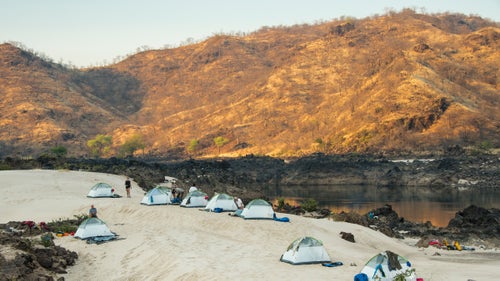 Second camp, Zambezi River, Zimbabwe. Although ROAM’s trips run as self-supported, leave-no-trace adventures, the camping is extremely comfortable—and include as many gin and tonics as you need to work off the pain of that day’s rafting.
