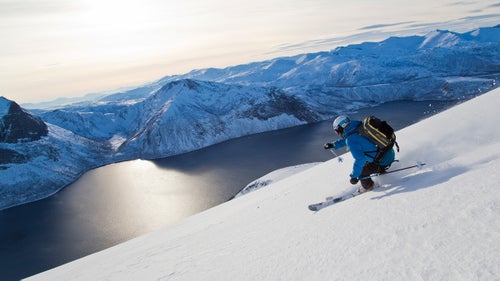 The penultimate day of our tour brought the softest conditions. The top crust that we penetrated on the skin up was buttery by the time we skied back down. That night, the skies remained clear and entertained us with a dance of green and pink northern lights until 2 a.m.