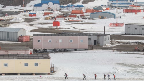 King George Island is typically the first of the six stages that make up the Antarctica edition of 4 Deserts. It includes Russian, Chinese, Uruguayan, and Chilean bases, among others, and has a small road network, making it easier to traverse than most other parts of the continent. And as the largest of the South Shetland Islands, it is relatively accessible by Antarctic standards. “There’s a lot of runnable terrain there,” Hermsmeyer said. “They always go there first, with the hopes that they can just bank a lot of mileage...That’s why, on the first day, they had them run for 12 and a half hours.”