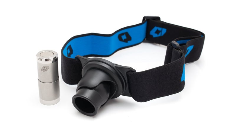 The magnetic base of the Atom flashlight in FourSevens' headlamp kit holds the light in the adaptor, or attaches it to your car.