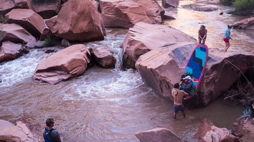 According to our map, there were at least two boulder jams that required scouting and possible portaging, but we ended up portaging more than twice. The mostly Class III river features miles of rocks and huge boulders, quick turns, and fast water.