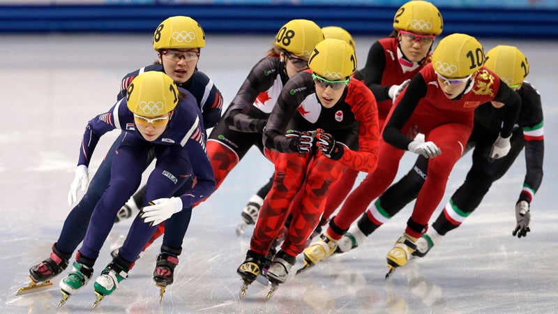 Shim Suk-Hee of South Korea, front left, Valerie Maltais of Canada, centre, and Fan Kexin of China, front right, compete in the women's 3000m short track speedskating relay final at the Iceberg Skating Palace during the 2014 Winter Olympics, Tuesday, Feb. 18, 2014, in Sochi, Russia. (AP Photo/Darron Cummings)