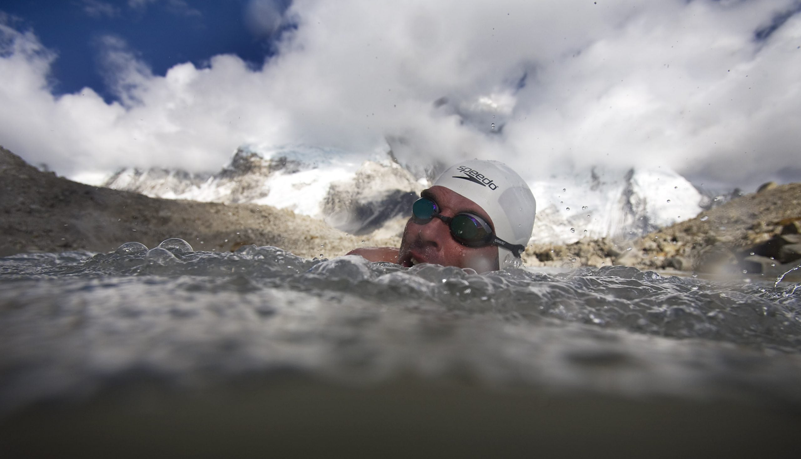 FIRST SWIM ON MT EVEREST
Environmental campaigner and endurance swimmer Lewis Gordon Pugh completes a record 1,000m swim across a glacial lake (at 5,300m in altitude) under the summit of Mt Everest to draw attention  to the melting of the Himalayan glaciers.  The expedition was sponsored by Pick n Pay and SAP.  
Photo by Michael Walker via Sat4Rent