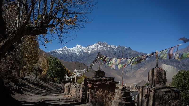 October 23, 2013 - Annapurna, Nepal - The road down through the Kali Gandaki River Valley from Muktinath to Tatopani. With views of the Annapurna Range of the Himalaya.