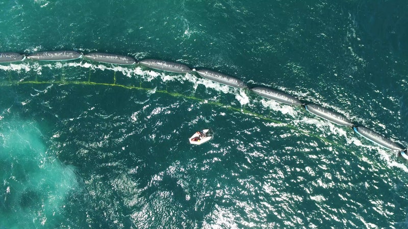 Testing a prototype of the Ocean Cleanup Array in the North Sea last summer.
