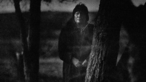 Nothing but the sound of cicadas and the wind: Angie Long Visitor stands above the infamous pasture.
