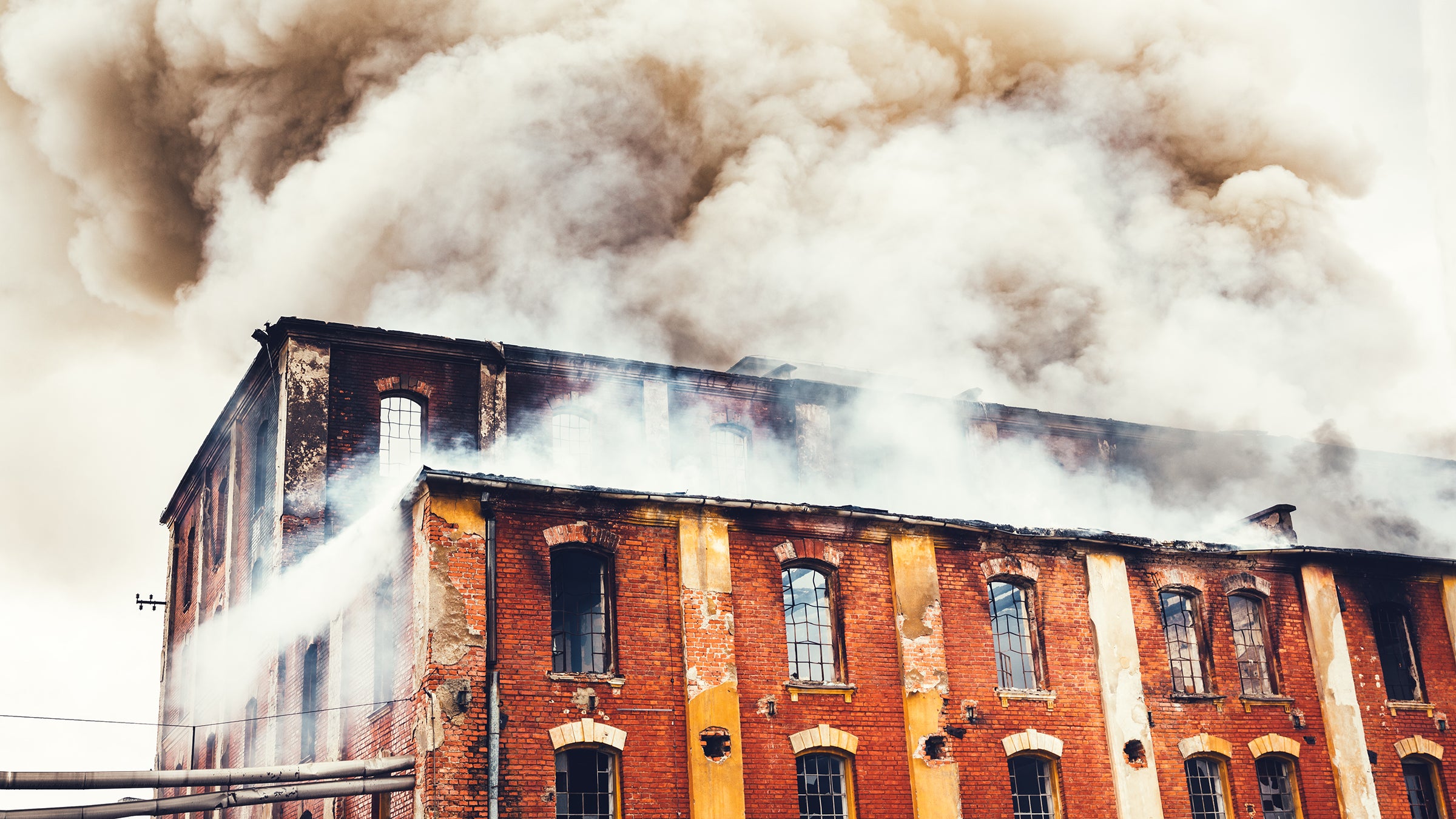 Thubron’s novel is structured around one place: a building that’s burning down.