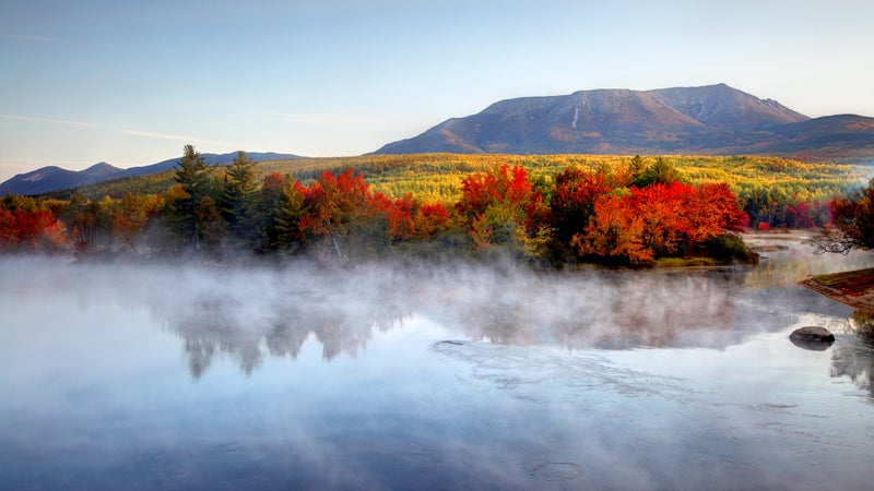 Mount Katahdin framed by Maine's legendary fall foliage.