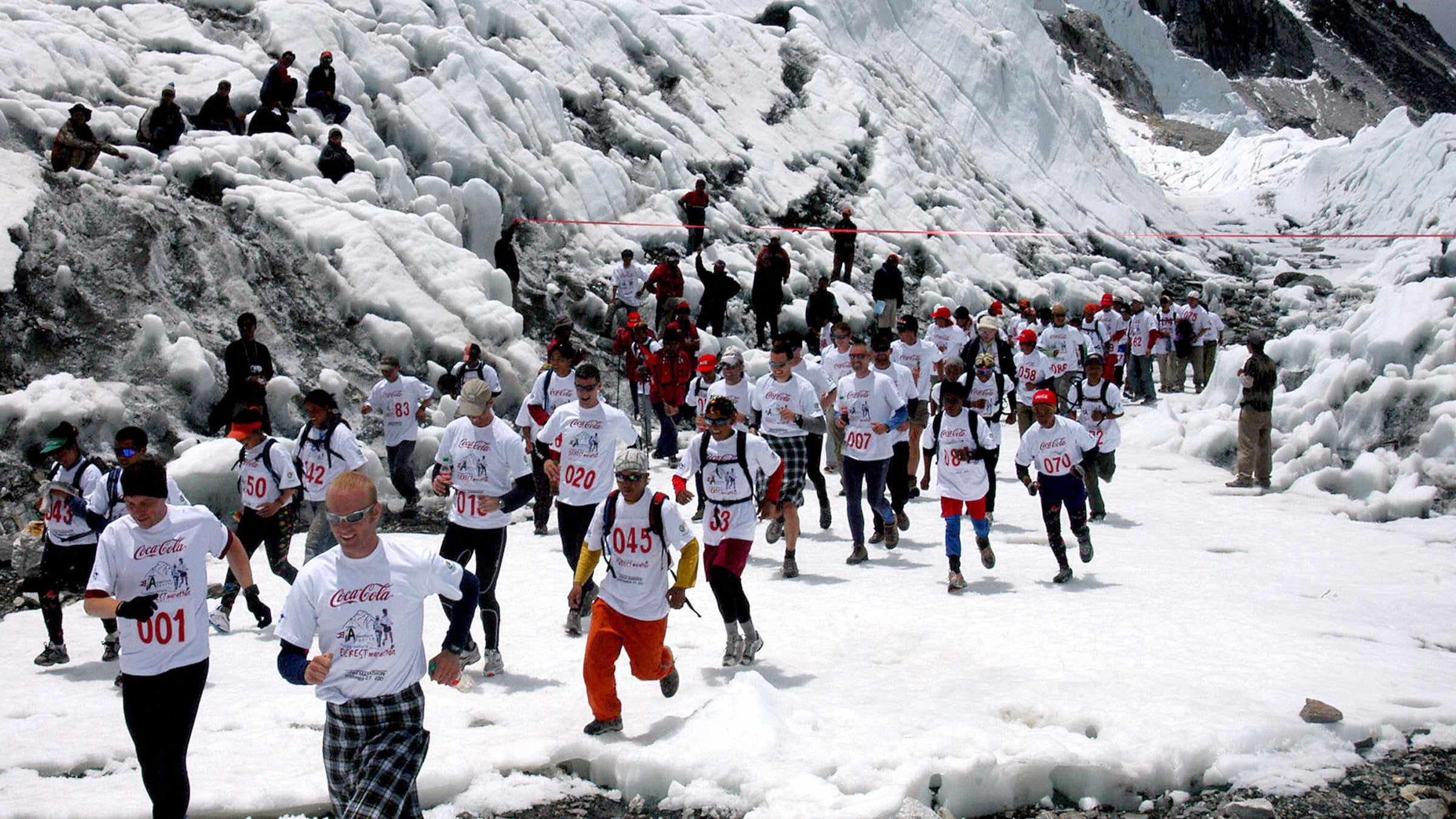 Marathoners run at the start of the Tenzing Hillary Everest Marathon at Everest Base Camp. 