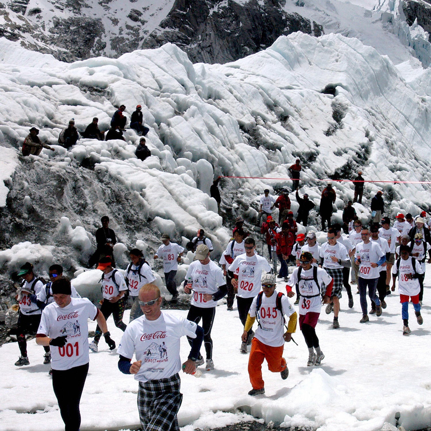 Marathoners run at the start of the Tenzing Hillary Everest Marathon at Everest Base Camp.