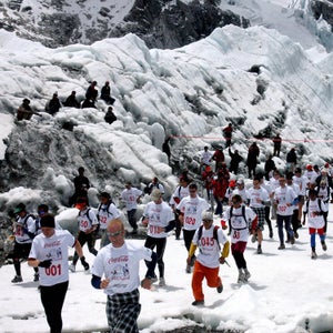 Marathoners run at the start of the Tenzing Hillary Everest Marathon at Everest Base Camp.
