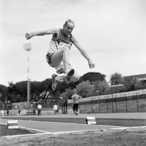 A senior long jumper competes in the 80-84-year-old age division at the 2007 World Masters Championships Stadia (track and field competition) in Riccione, Italy.