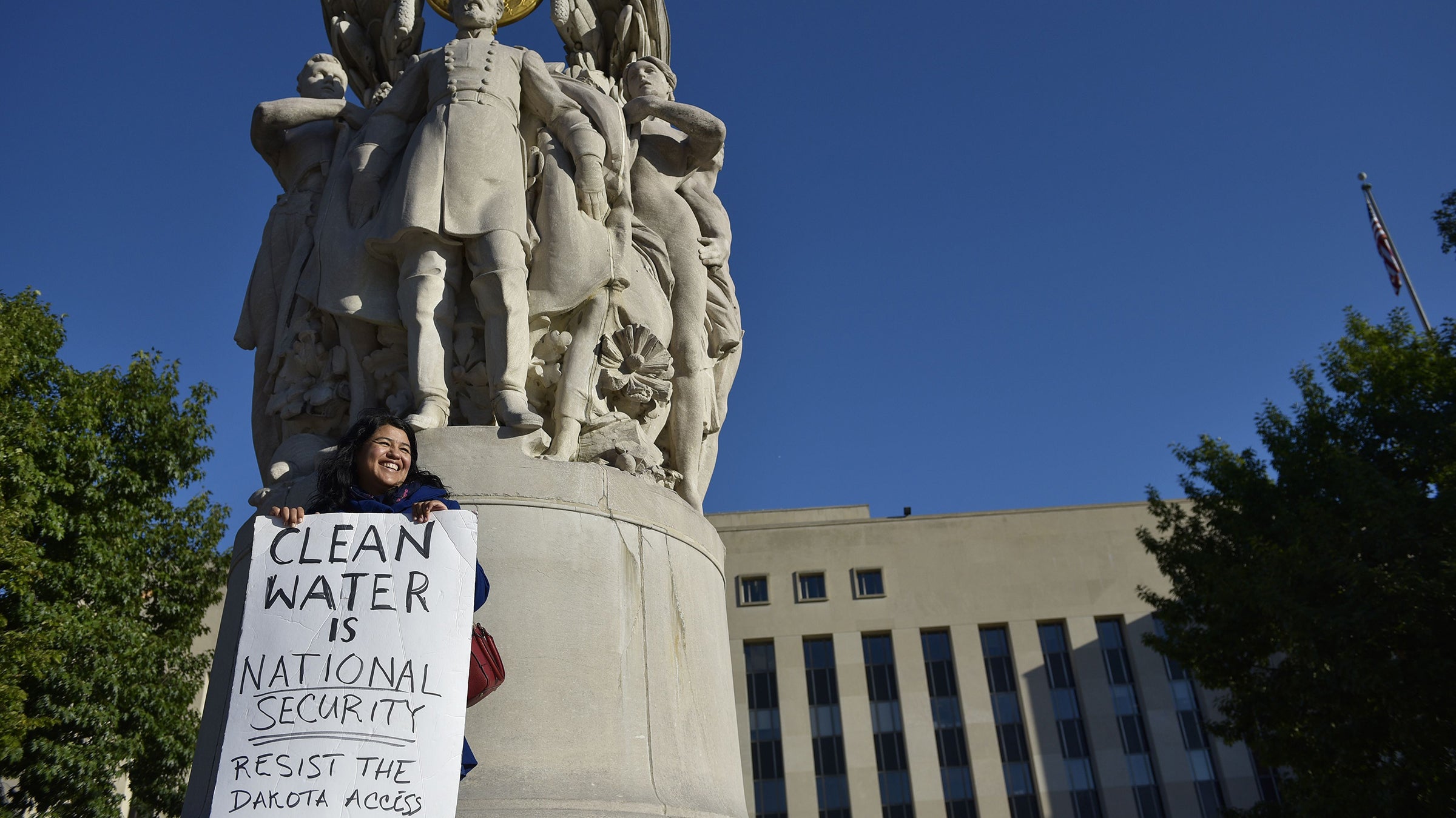 A protestor outside the E. Barrett Prettyman U.S. Courthouse, home of the U.S. Court of Appeals for the D.C. Circuit.