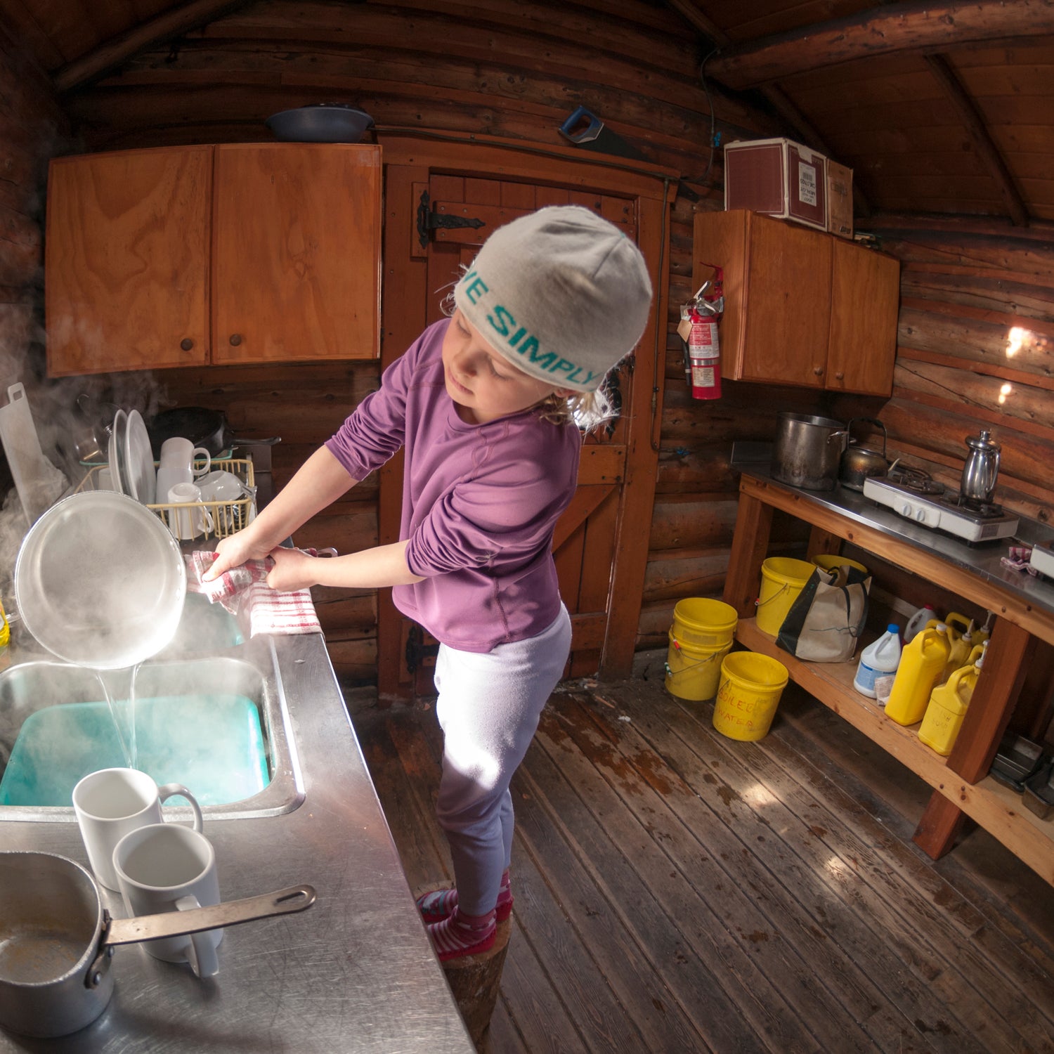 Doing dishes in the Elizabeth Parker Hut in Yoho National Park, British Columbia.