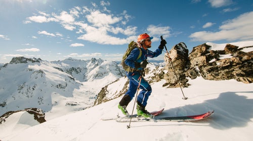 Solved An 79.5 kg skier is gliding on her waxed wood skis