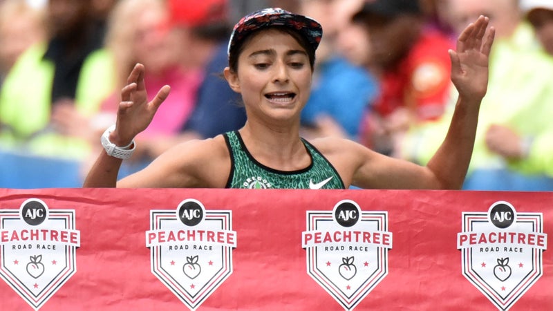 Alexi Pappas wins the women's division of the 2015 AJC Peachtree Road Race in Atlanta.