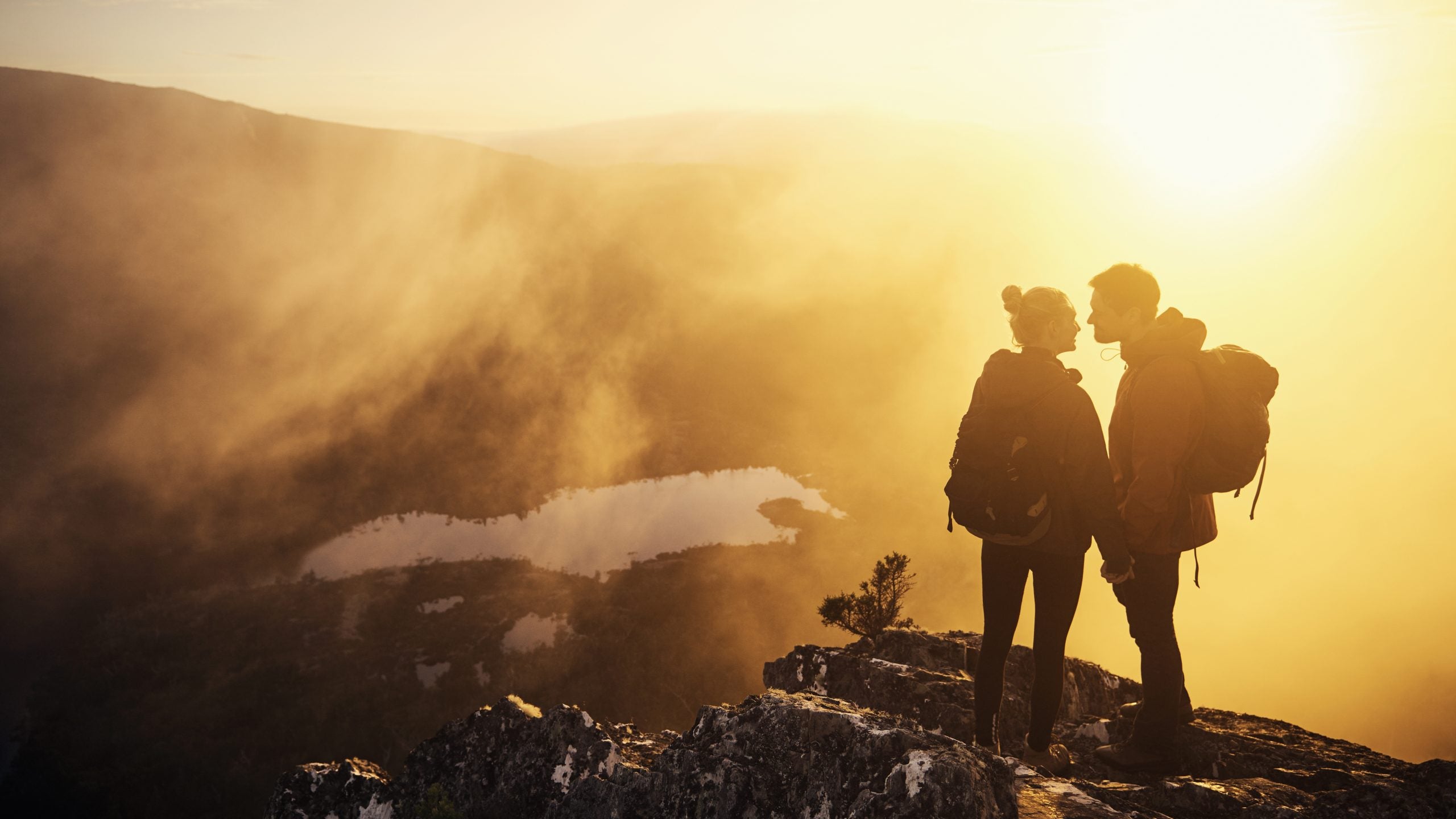 Image of Couple hiking in mountains