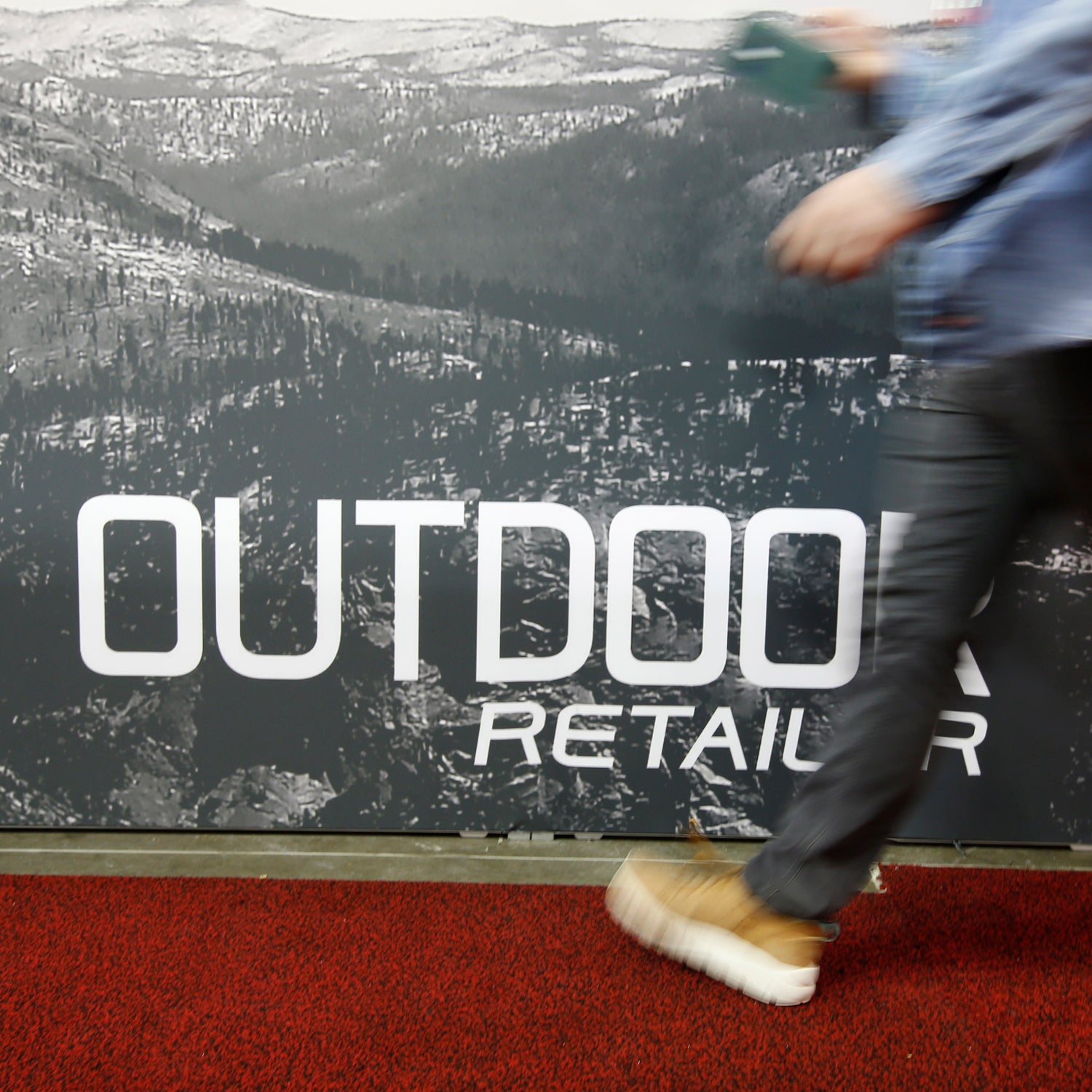 SALT LAKE CITY, UT - JANUARY 11: A person walks by a sign at the 2017 Outdoor Retailers Show, Winter Market, January 11, 2017 in Salt Lake City, Utah. Patagonia, a major retailer at the show, announced February 7, 2017 their withdrawal from the show in Salt Lake City in response to a resolution passed last week by the Utah State legislature and signed by Governor Gary Herbert, calling on the Trump administration to challenge the Bear Ears National Monument designated by former President Barack Obama. (Photo by George Frey/Getty Images)