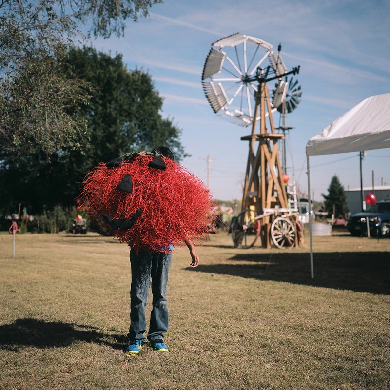 Every year, the tiny town of Haigler, Nebraska holds a tumbleweed festival. It was inspired by a tumbleweed storm roughly a decade ago. One of their events is a tumbleweed decorating contest, where local kids and their families go out, find a tumbleweed, and pretty it up. This is Max Franco and his pumpkin entry.