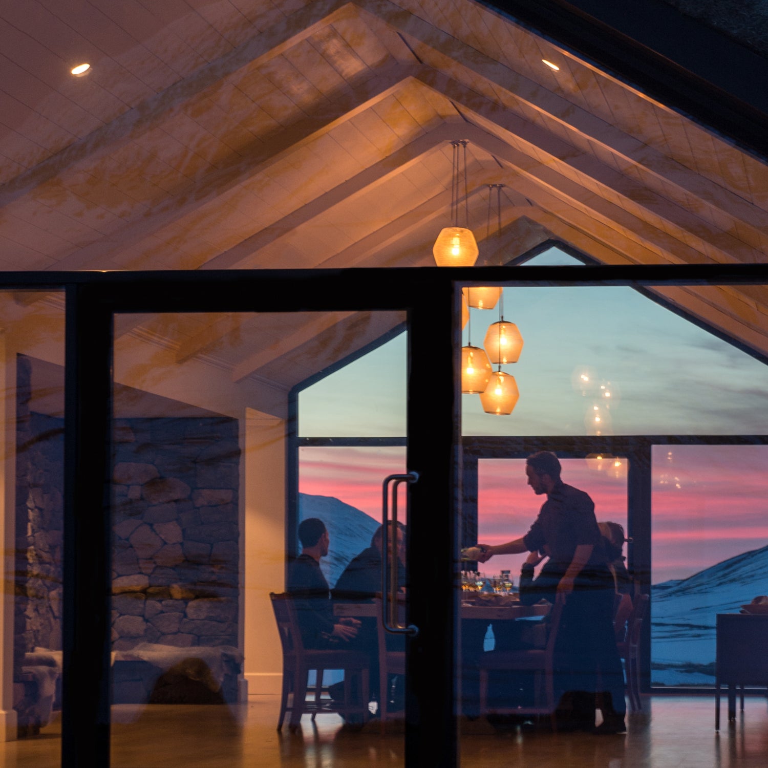 Three course meals by the live-in chef go well with Icelandic sunsets.