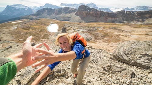 Giving each other a helping hand—easy when literal, figuratively harder.