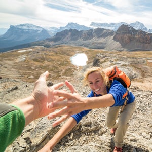 Giving each other a helping hand—easy when literal, figuratively harder.