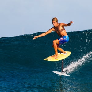 Kai Lenny hydrofoil surfing off Namotu Island, Fiji.
