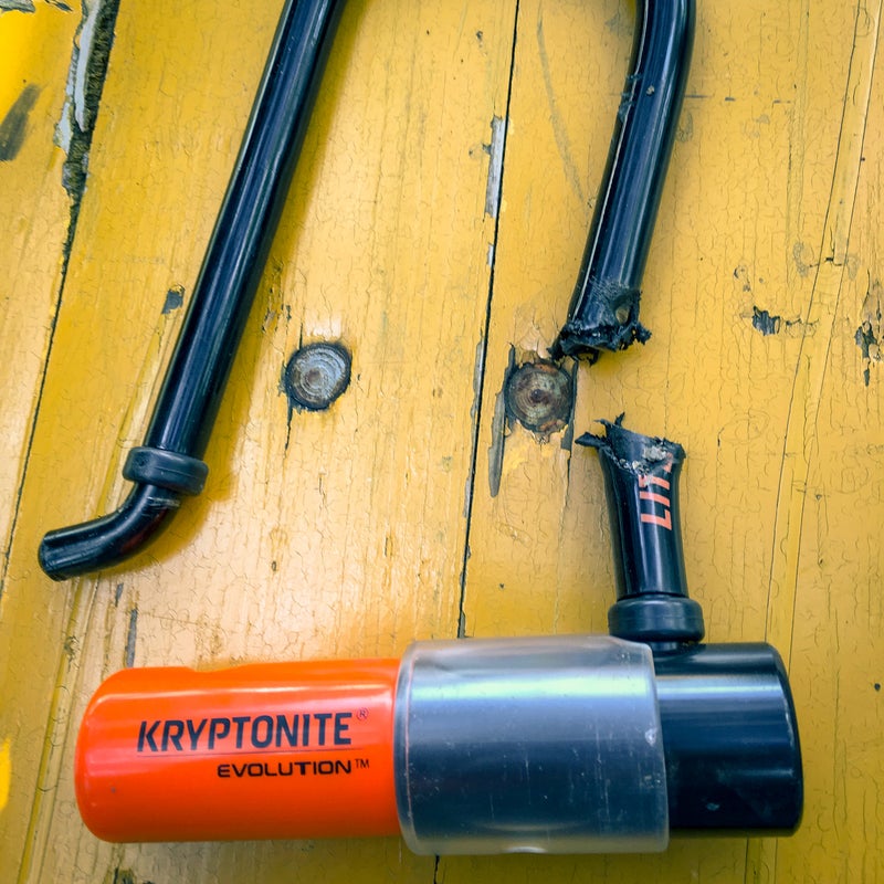 The Kryptonite Evolution LITE Mini-6 U-lock after an ugly meeting with an angle grinder.
