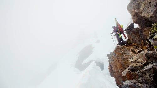 The winter of 2014–15 was record setting in Washington—and not in a good way. Lakes that would otherwise be buried in feet of snow were half melted out. An entire season of snowfall didn’t add up to a week’s worth of snow during a normal season. Ski areas were closed, but snow could still be found on the perennial snowfields high in the alpine. On big snowfields, like the Olympic Traverse that Tim Black is looking at here, sometimes there’s nothing but white on white intermixed with occasional rock outcroppings, which makes visibility tough.