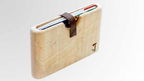 This wallet is carved from a single piece of wood.