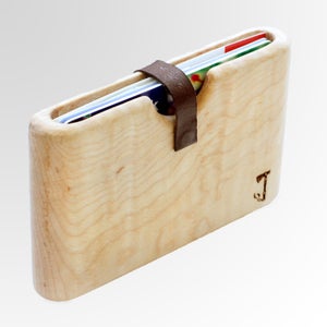 This wallet is carved from a single piece of wood.