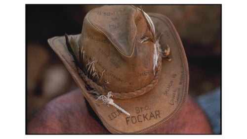 An image from 1984 of my dad, who kept track of all of the big-drops and rapids by burning them into his leather hat.