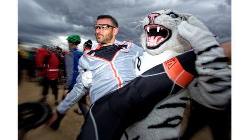 A participant demonstrates partner-assisted prerace stretching. There is no prize money at 24 Hours in the Old Pueblo. The goal is to donate $20,000 to local charities. Race organizer Todd Sadow has a simple formula for raising the funds and keeping participants coming back again. “What I’ve always wanted for all Epic Rides events is for all levels of mountain bikers to feel welcomed,” he says. “We’ve always made a concerted effort to keep our entry fees low while providing all our attendees an experience beyond measure.”