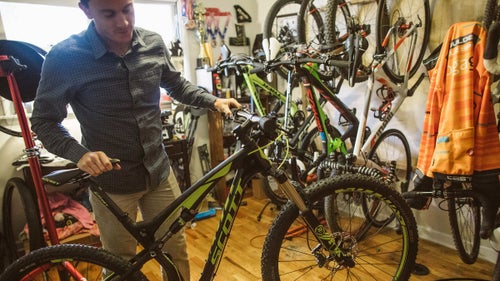 The star of the rack, Baddick’s Scott Spark race bike is “super light” and pretty easy to wrench on, he says.