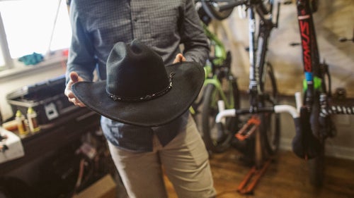 Chris won this cowboy hat at the Steamboat Stinger and proudly displays it in his bike room. “Every single year, someone else walked away with it, but this year, it was my year.”