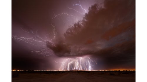 A stack of 12 separate lightning images merged into one, near the town of Casa Grande, Arizona.