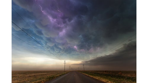 A bubbly layer of mammatus clouds hang over Texas farmlands.