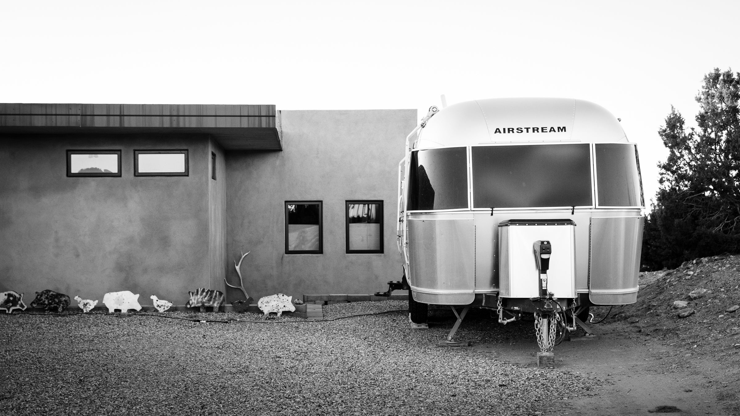 It’s disconcerting to pull into your driveway, then, rather than go inside, pull out the red, 30-amp cord and plug into the outdoor outlet.