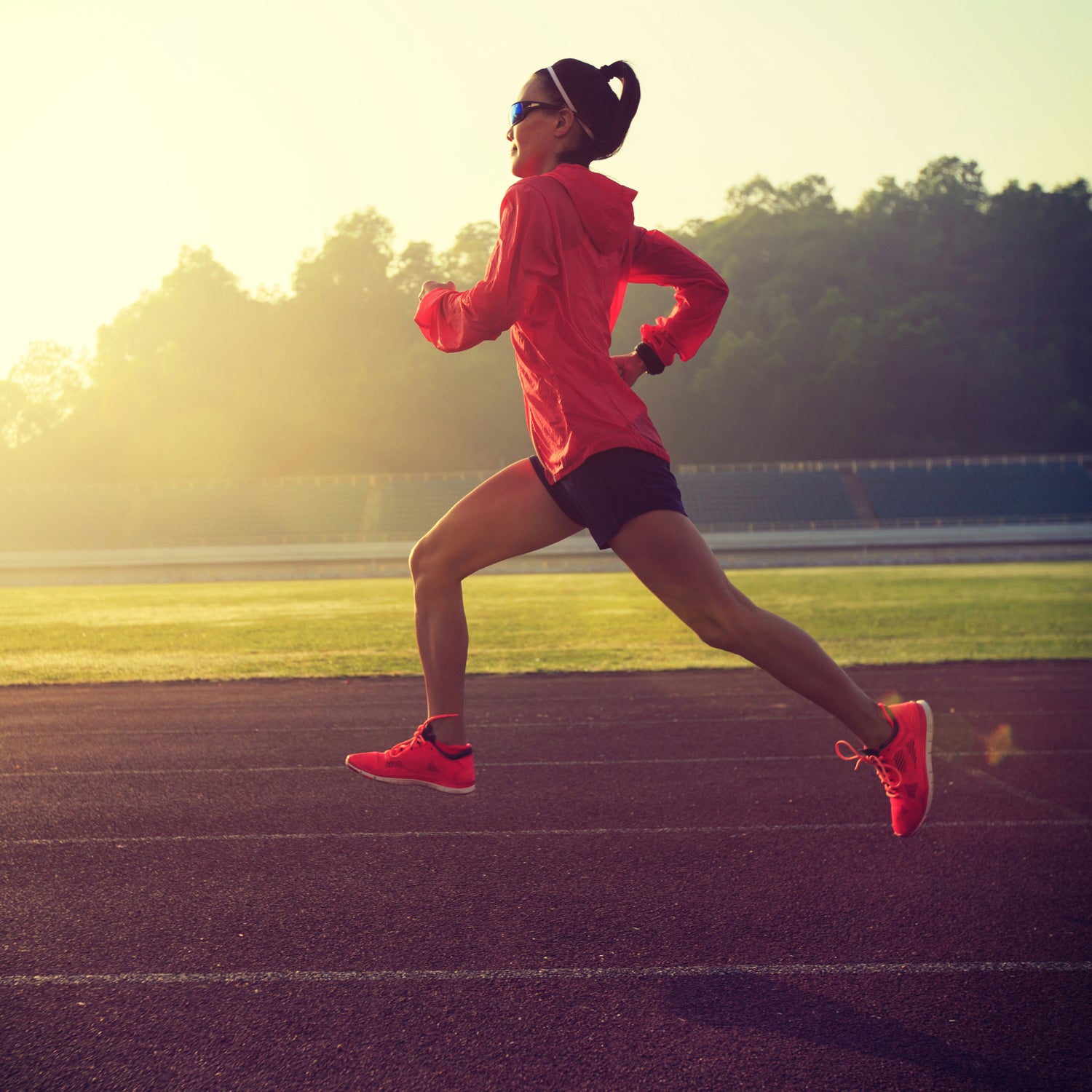 Premium Photo  Girl athlete does warmup on legs before physical exertion  workout on the street site