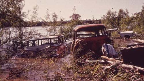 Abandoned cars along the Mississippi River, near New Orleans.