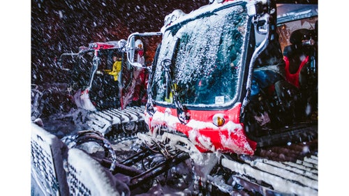 Whether it鈥檚 snowing or not, the runs need to get groomed. On this particular night, snow was dumping. The guys started the cats鈥 diesel engines a few minutes early to get them warm.