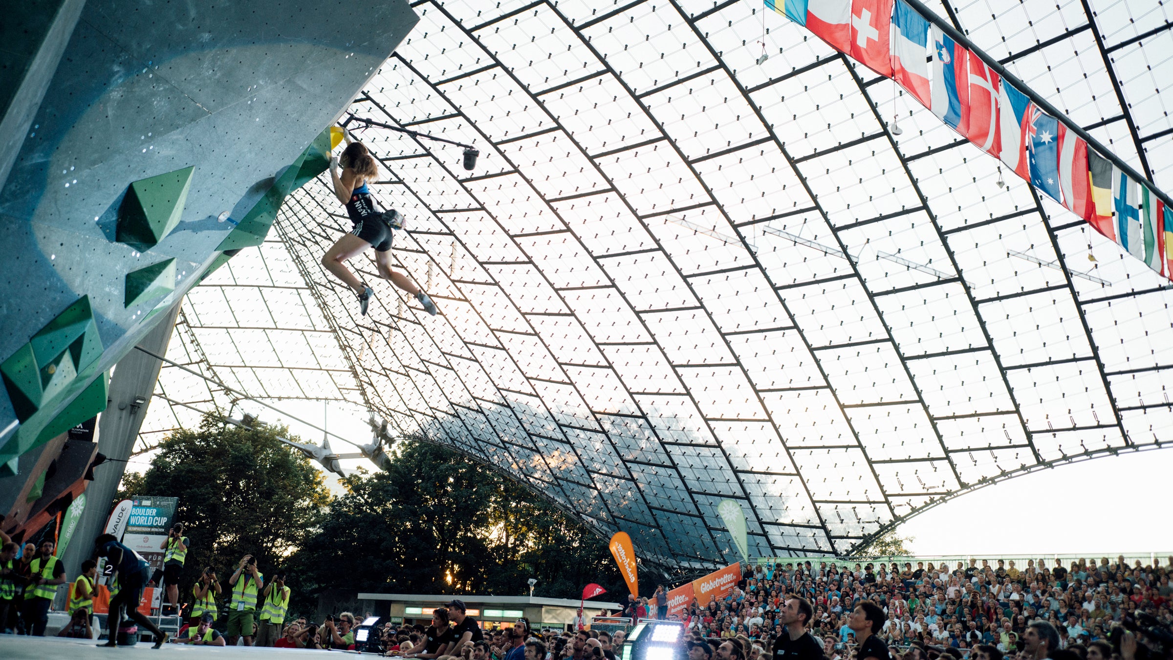 Miho Nonaka climbs a bouldering wall during the 2016 IFSC Boulder World Cup in Munich, Germany. 