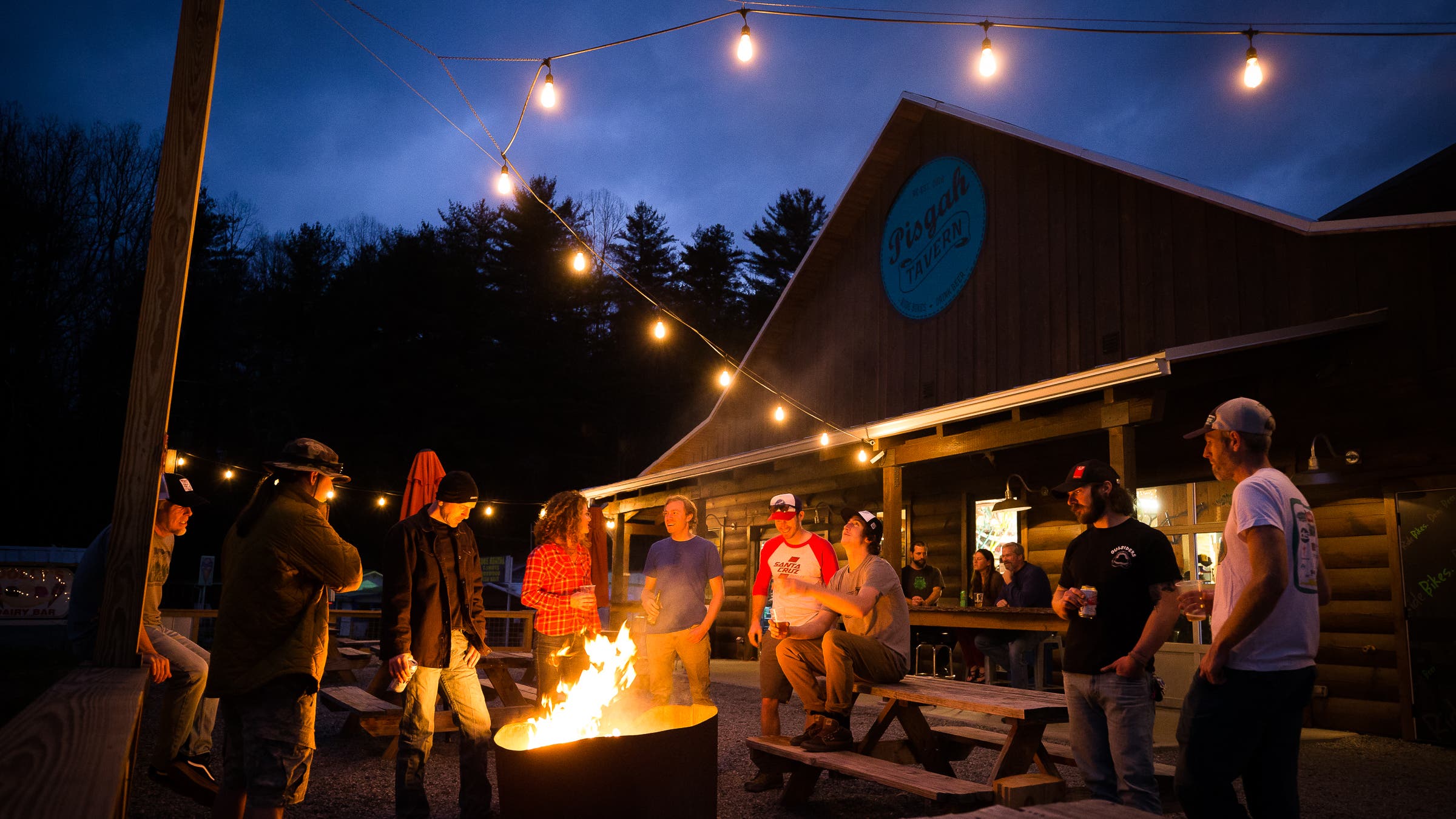 A timeless pastime—beers around a fire at the Hub at the entrace to the Pisgah National Forest.
